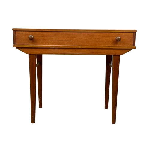 901 - A Mid Century Swedish style teak side table with drawer. 1960’s. 92.5 x 46.5 x 75cm