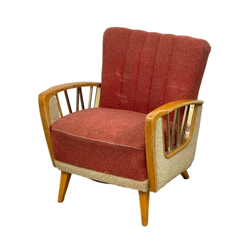 903 - A 1950’s Mid Century continental solid beech framed armchair, with original 2 tone upholstery. 67 x ... 