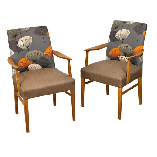 905 - A pair of good quality Mid Century teak carver armchairs. 1960’s.