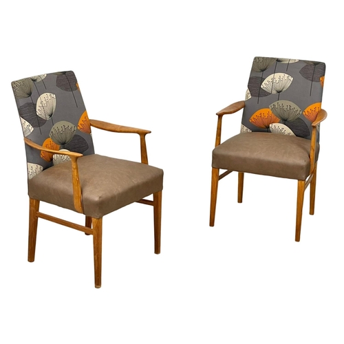 905 - A pair of good quality Mid Century teak carver armchairs. 1960’s.