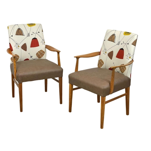 908 - A pair of good quality Mid Century teak carver armchairs. 1960’s.