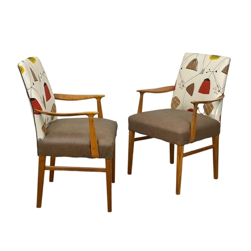 908 - A pair of good quality Mid Century teak carver armchairs. 1960’s.