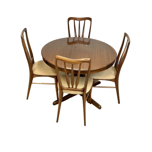 921 - A Danish table and 4 “Ingrid” chairs designed by Niels Keofoed for Koefoeds Hornslet. Mid Century. D... 