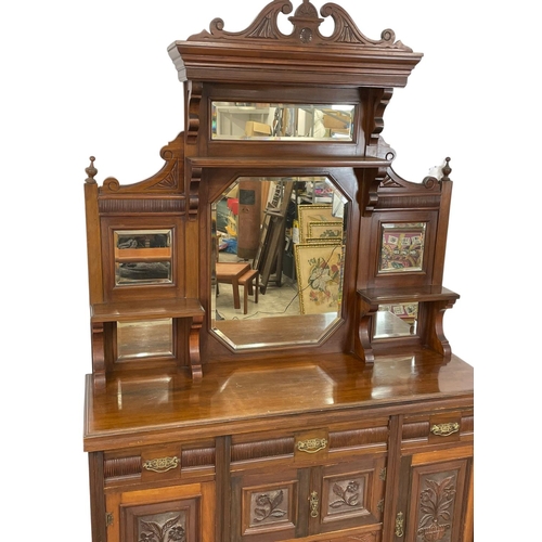 945 - A large Edwardian mirror back sideboard. 151 x 49 x 225cm