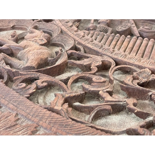 958 - A late 19th century ornate Burmese carved teak pedestal table. Circa 1890-1900. 76.5 x 68.5cm