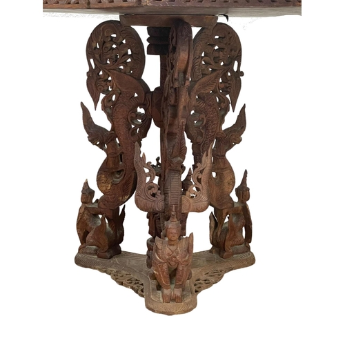 958 - A late 19th century ornate Burmese carved teak pedestal table. Circa 1890-1900. 76.5 x 68.5cm