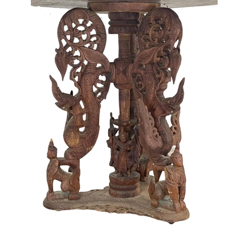 958 - A late 19th century ornate Burmese carved teak pedestal table. Circa 1890-1900. 76.5 x 68.5cm