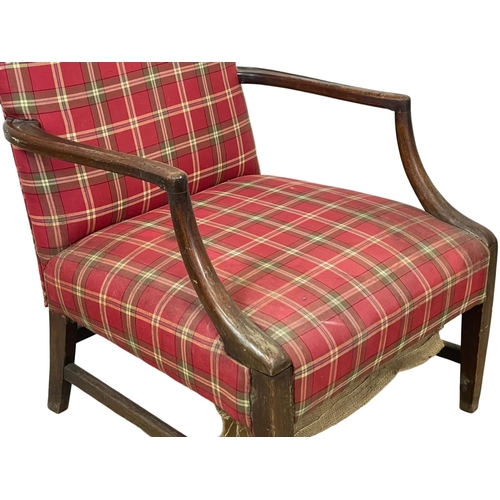 960 - A George III mahogany Gainsborough style armchair. Circa 1800.