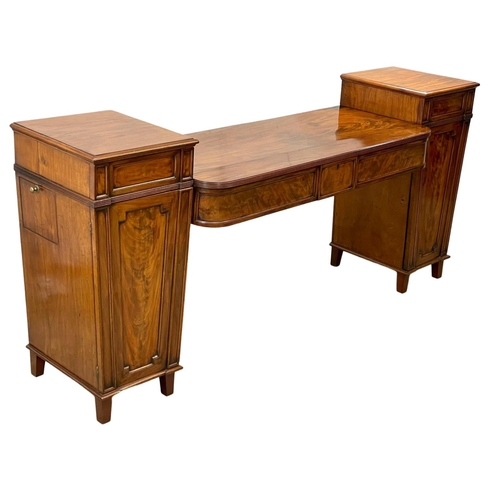 973 - A large late George III flamed mahogany pedestal sideboard. Circa 1800-1820. 247.5 x 64 x 111.5cm