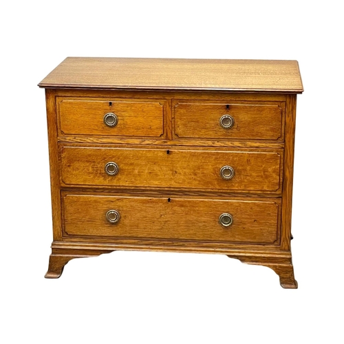 978 - An Edwardian oak chest of drawers. 99 x 50 x 80cm