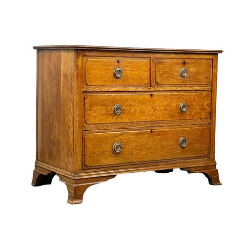 978 - An Edwardian oak chest of drawers. 99 x 50 x 80cm