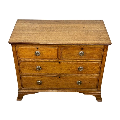 978 - An Edwardian oak chest of drawers. 99 x 50 x 80cm