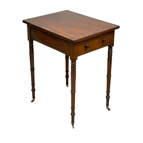 981 - A George IV mahogany double drawer side table with rosewood cross banding. Circa 1820. 47.5 x 61 x 7... 