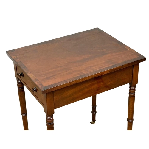 981 - A George IV mahogany double drawer side table with rosewood cross banding. Circa 1820. 47.5 x 61 x 7... 