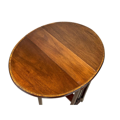 986 - An Edwardian inlaid mahogany Sutherland table. Open 63 x 60 x 62cm. Closed 18cm