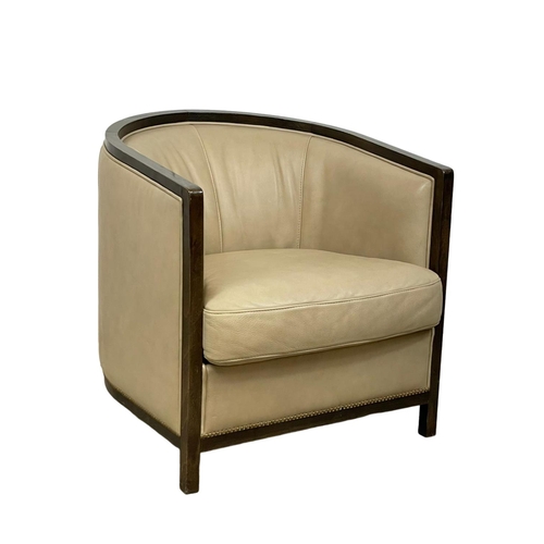 988 - A large Art Deco style leather tub chair. 74 x 81 x 77cm