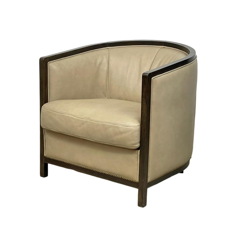 988 - A large Art Deco style leather tub chair. 74 x 81 x 77cm