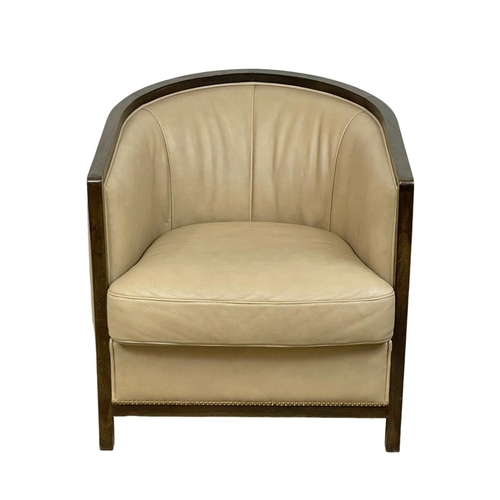 988 - A large Art Deco style leather tub chair. 74 x 81 x 77cm