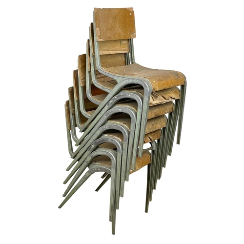 993 - A set of 7 vintage Esavian metal framed stacking chairs.