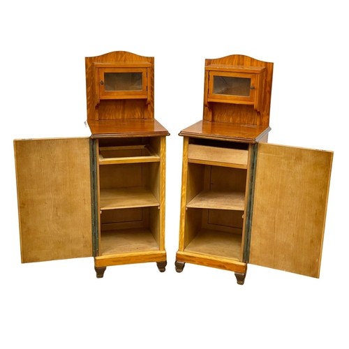 856 - A pair of Art Deco style bedside cupboards. 40 x 39 x 112.5cm