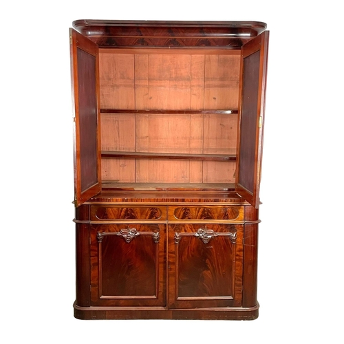 859 - A large Victorian mahogany bookcase, with mirrored doors and 2 drawers. 157 x 61 x 243cm