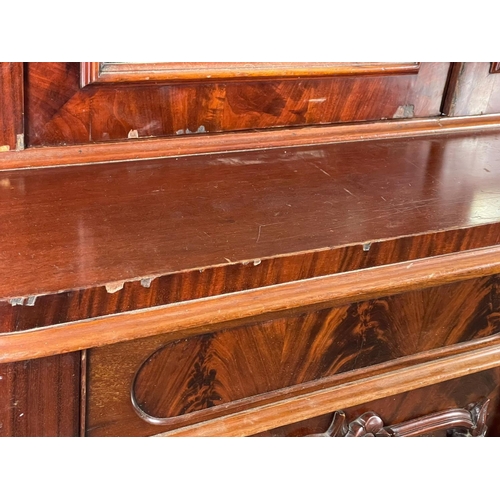 859 - A large Victorian mahogany bookcase, with mirrored doors and 2 drawers. 157 x 61 x 243cm