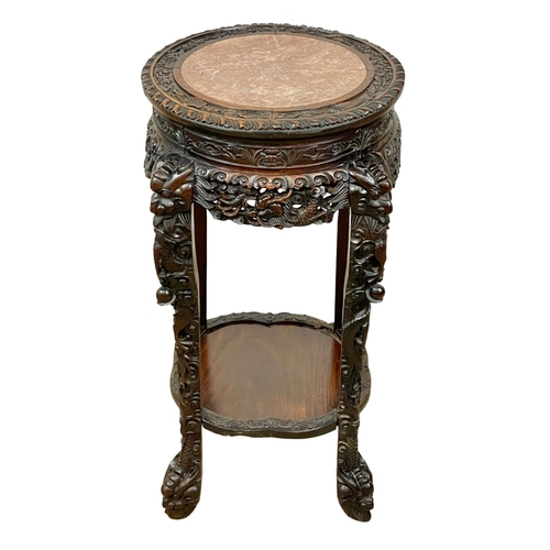 860 - A large Chinese 19th century carved Paduak wood plantstand with marble top. 41 x 83cm