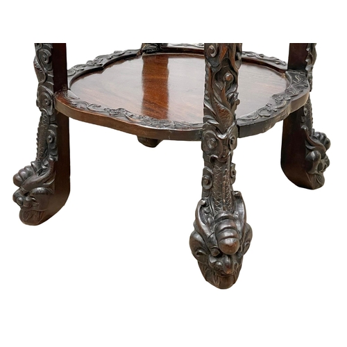 860 - A large Chinese 19th century carved Paduak wood plantstand with marble top. 41 x 83cm