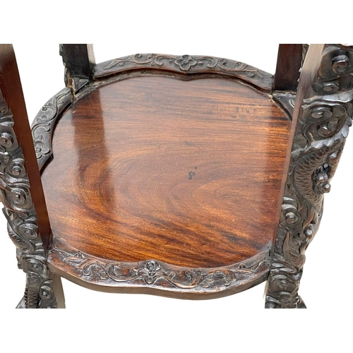 860 - A large Chinese 19th century carved Paduak wood plantstand with marble top. 41 x 83cm