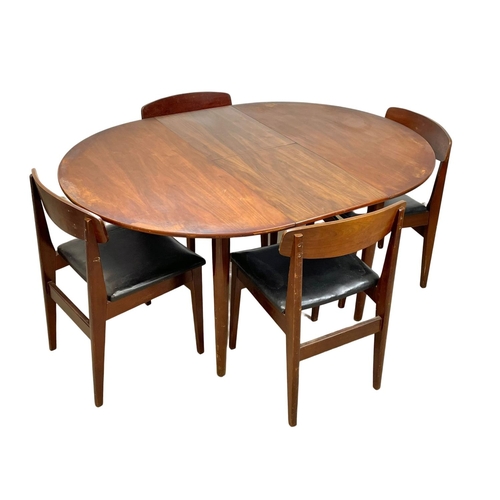 912 - A Mid Century teak table and 4 chairs. Open 146 x 108 x 73cm.