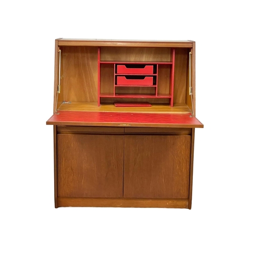 914 - A Mid Century teak bureau by Remploy. 91 x 41 x 111.5cm