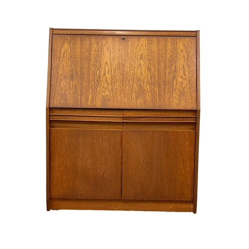 914 - A Mid Century teak bureau by Remploy. 91 x 41 x 111.5cm