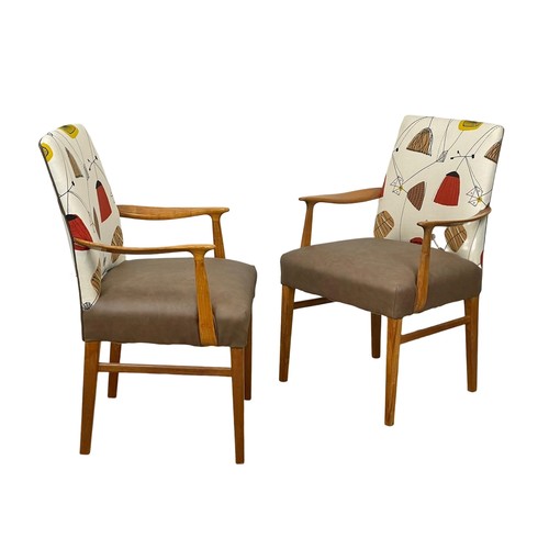 909 - A pair of good quality Mid Century teak carver armchairs. 1960’s.