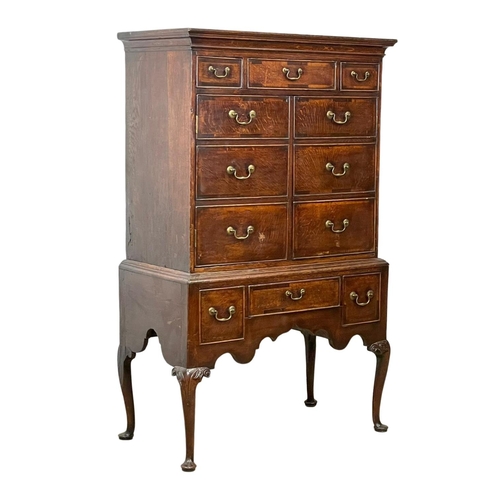 880 - An early George III oak chest on stand, with mahogany cross banding. Circa 1760. 101 x 54 x 164.5cm