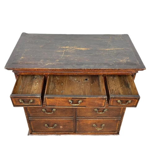 880 - An early George III oak chest on stand, with mahogany cross banding. Circa 1760. 101 x 54 x 164.5cm