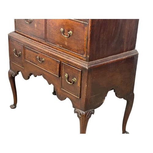 880 - An early George III oak chest on stand, with mahogany cross banding. Circa 1760. 101 x 54 x 164.5cm