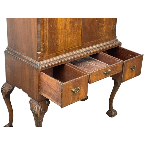 881 - A large early 20th century George III style mahogany cocktail cabinet with 3 drawers and on Ball & C... 