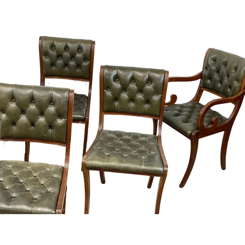 885 - A set of 6 deep button leather Regency style dining chairs.