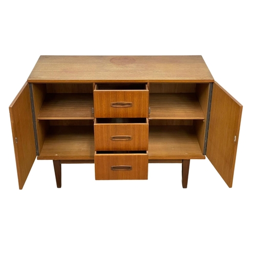 890 - A compact Mid Century teak sideboard. 1960’s. 108 x 46.5 x 77cm