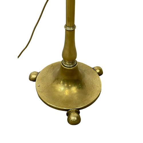 975 - A tall late Victorian brass electrified oil lamp. Circa 1900. 175.5cm