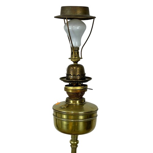 975 - A tall late Victorian brass electrified oil lamp. Circa 1900. 175.5cm