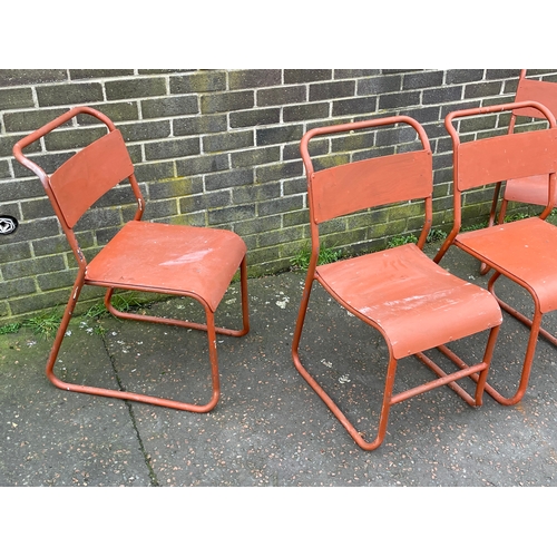 1065 - A set of 4 vintage Cox stacking chairs.