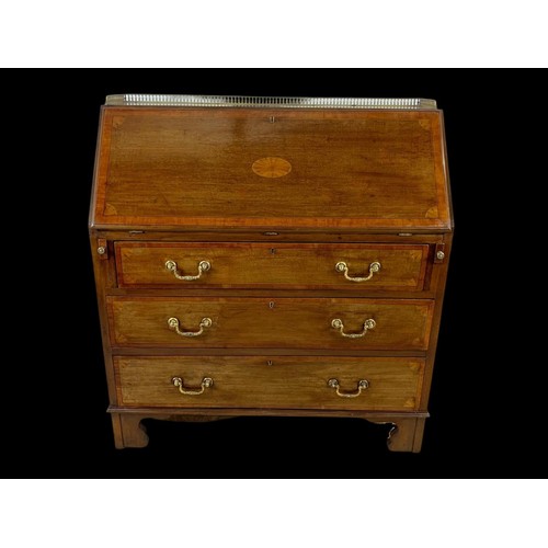 1066 - A late Victorian Sheraton revival inlaid mahogany writing bureau with brass gallery. 91 x 42 x 99.5c... 