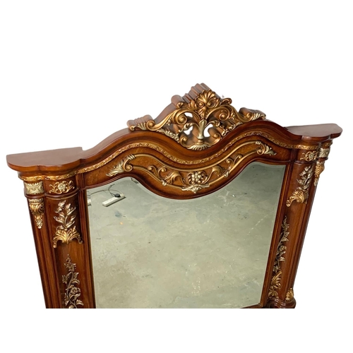 1071 - A large ornate over-mantle mirror. 149 x 146.5cm