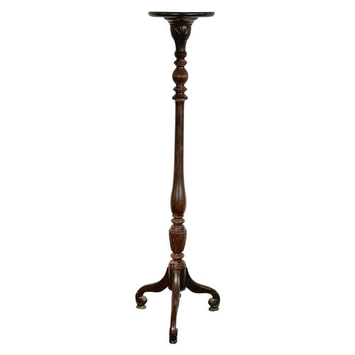 1072 - A tall mahogany jardiniere stand