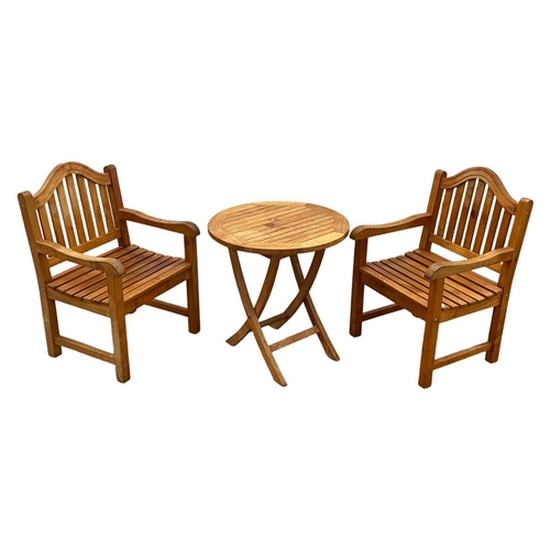 1073 - A pair of good quality solid teak garden armchairs with matching table, From Lighthouse Collection. ... 