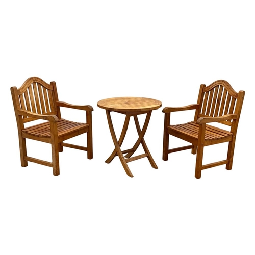 1073 - A pair of good quality solid teak garden armchairs with matching table, From Lighthouse Collection. ... 