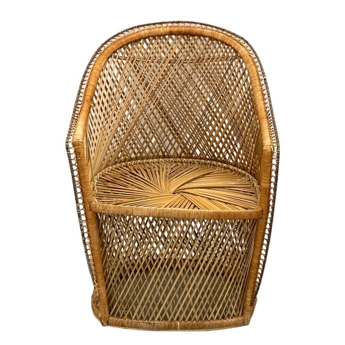 1074 - A small cane armchair