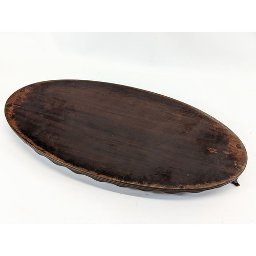 81 - An Edwardian mahogany serving tray. 67x32cm