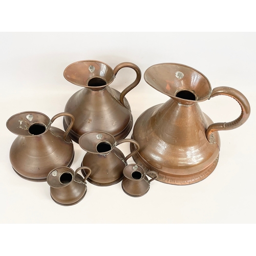 5 - A set of 6 19th century Victorian copper jugs. Imperial Gallon measures 28 x 33 x 29cm